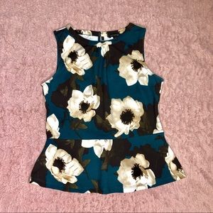 Floral peplum blouse! Work top, very classy.